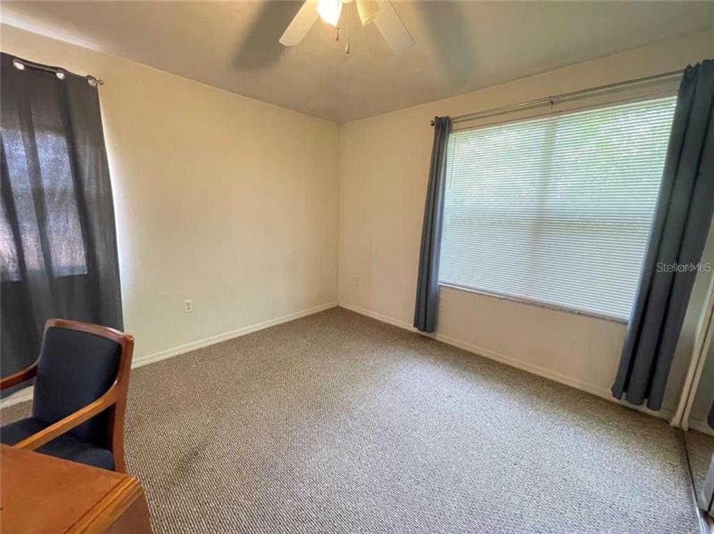 3860 Southwest 20th Avenue, Unit 1801 Gainesville, FL 32607 - Photo 12 of 19 an empty room with window