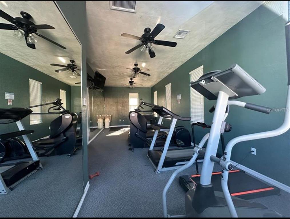 3860 Southwest 20th Avenue, Unit 1801 Gainesville, FL 32607 - Photo 19 of 19 a view of a room with gym equipment
