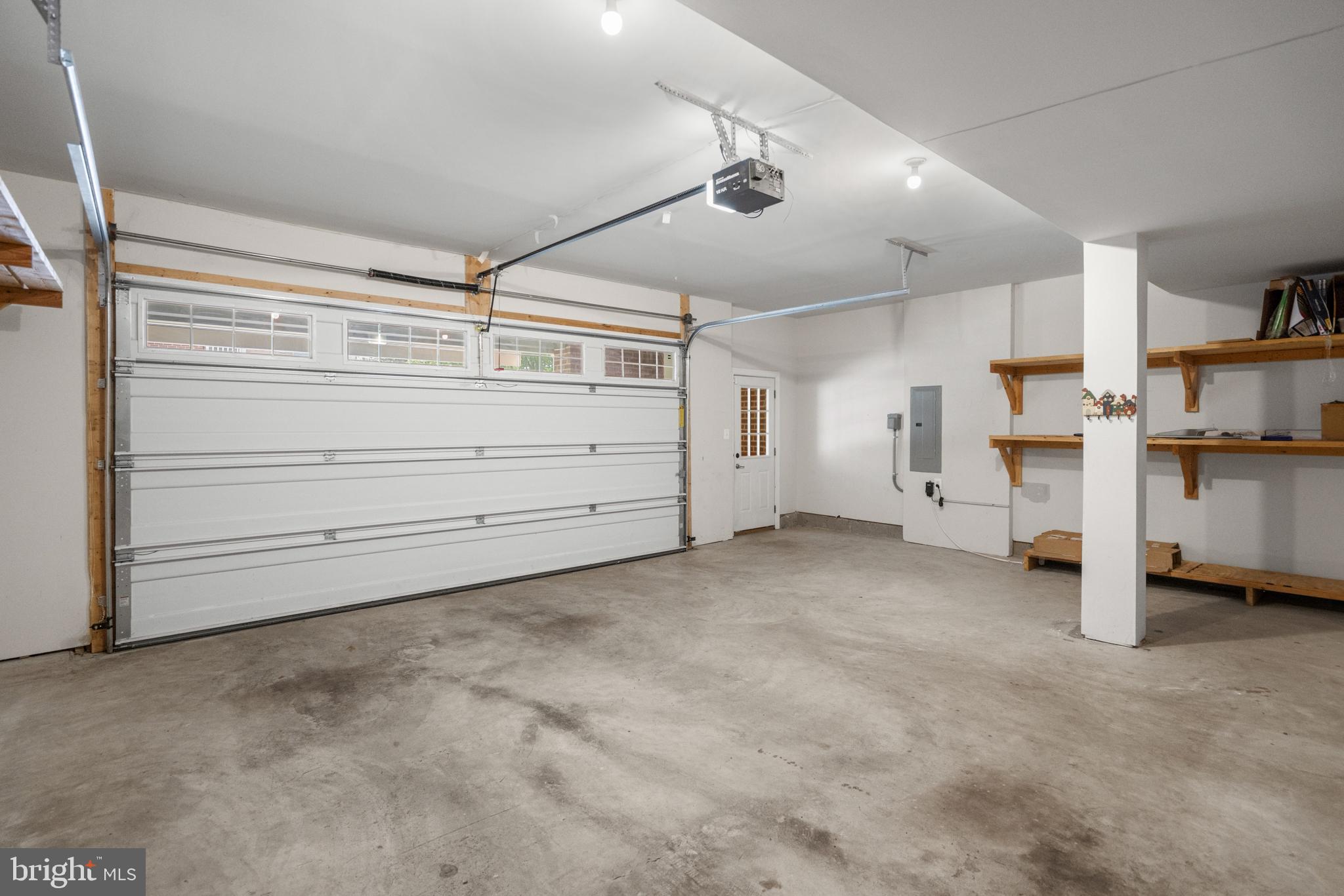 493 Watkins Mill Road Gaithersburg, MD 20878 - Photo 57 of 59 Spacious garage with ample storage.