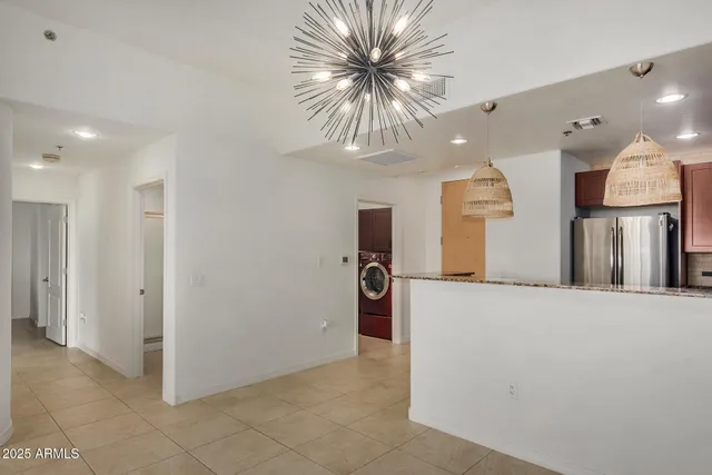 a view of livingroom and kitchen with furniture
