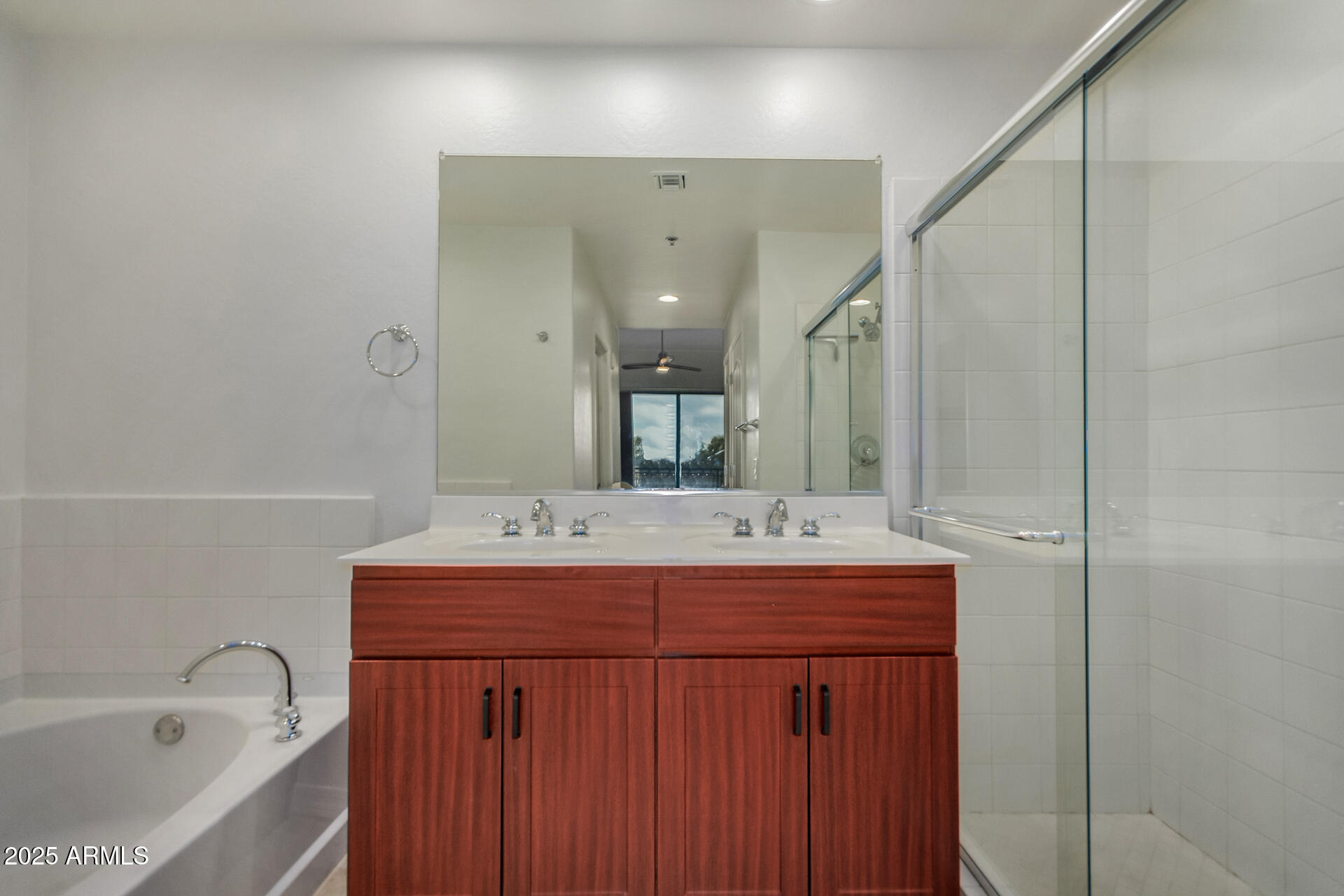 2302 North Central Avenue, Unit 206 Phoenix, AZ 85004 - Photo 17 of 35 a bathroom with a sink and a mirror