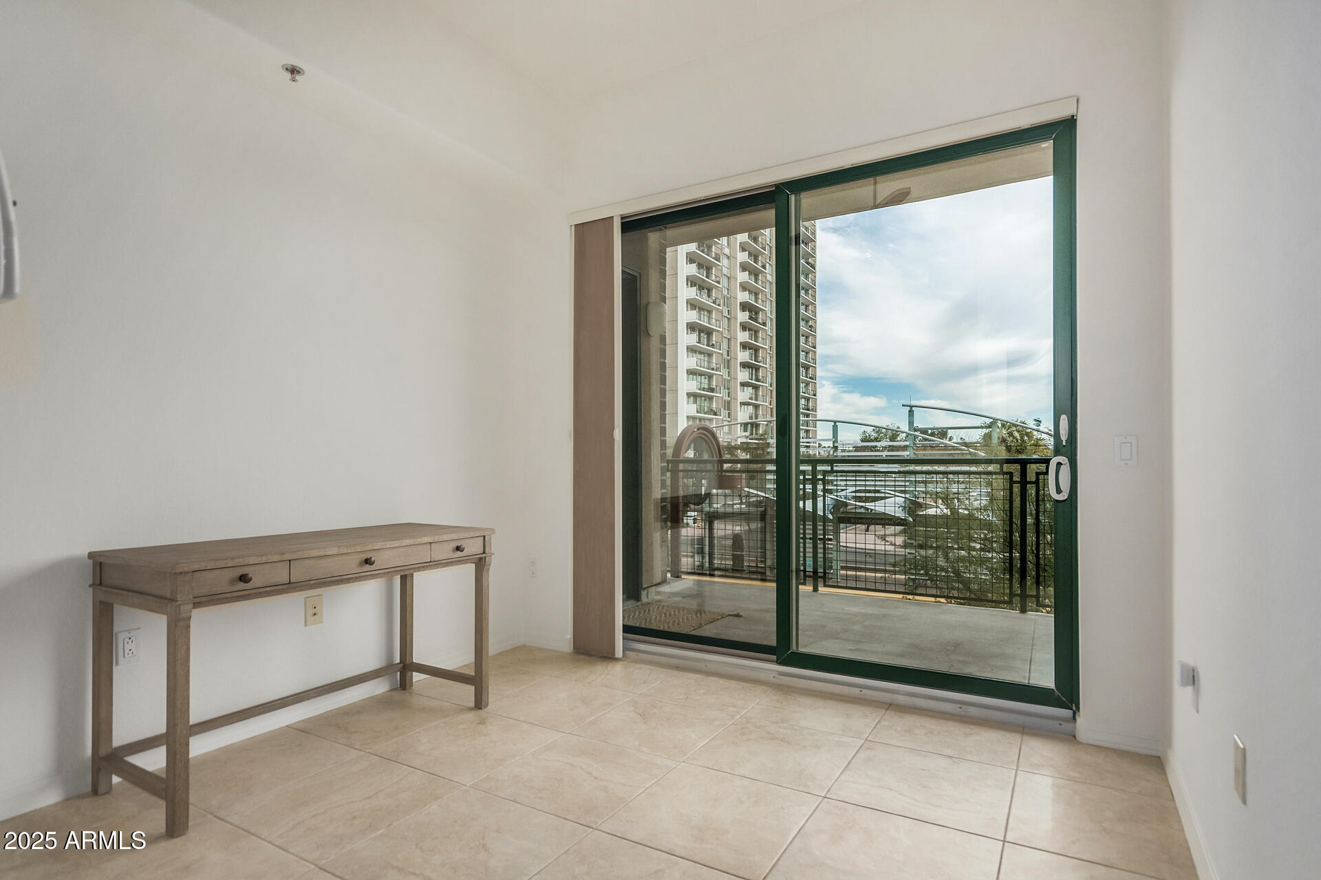 2302 North Central Avenue, Unit 206 Phoenix, AZ 85004 - Photo 21 of 35 a view of a room with sliding door