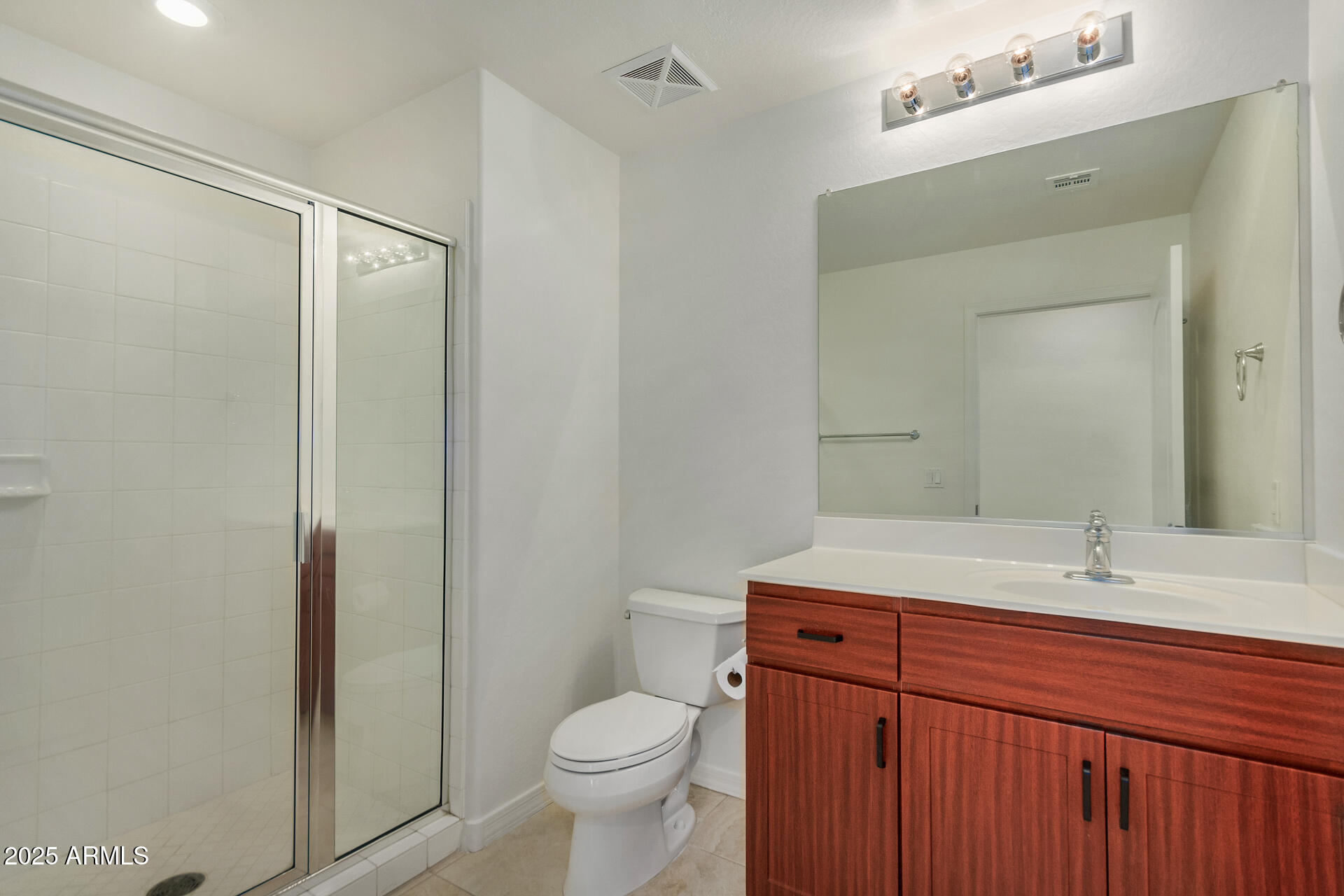 2302 North Central Avenue, Unit 206 Phoenix, AZ 85004 - Photo 23 of 35 a bathroom with a sink toilet and shower