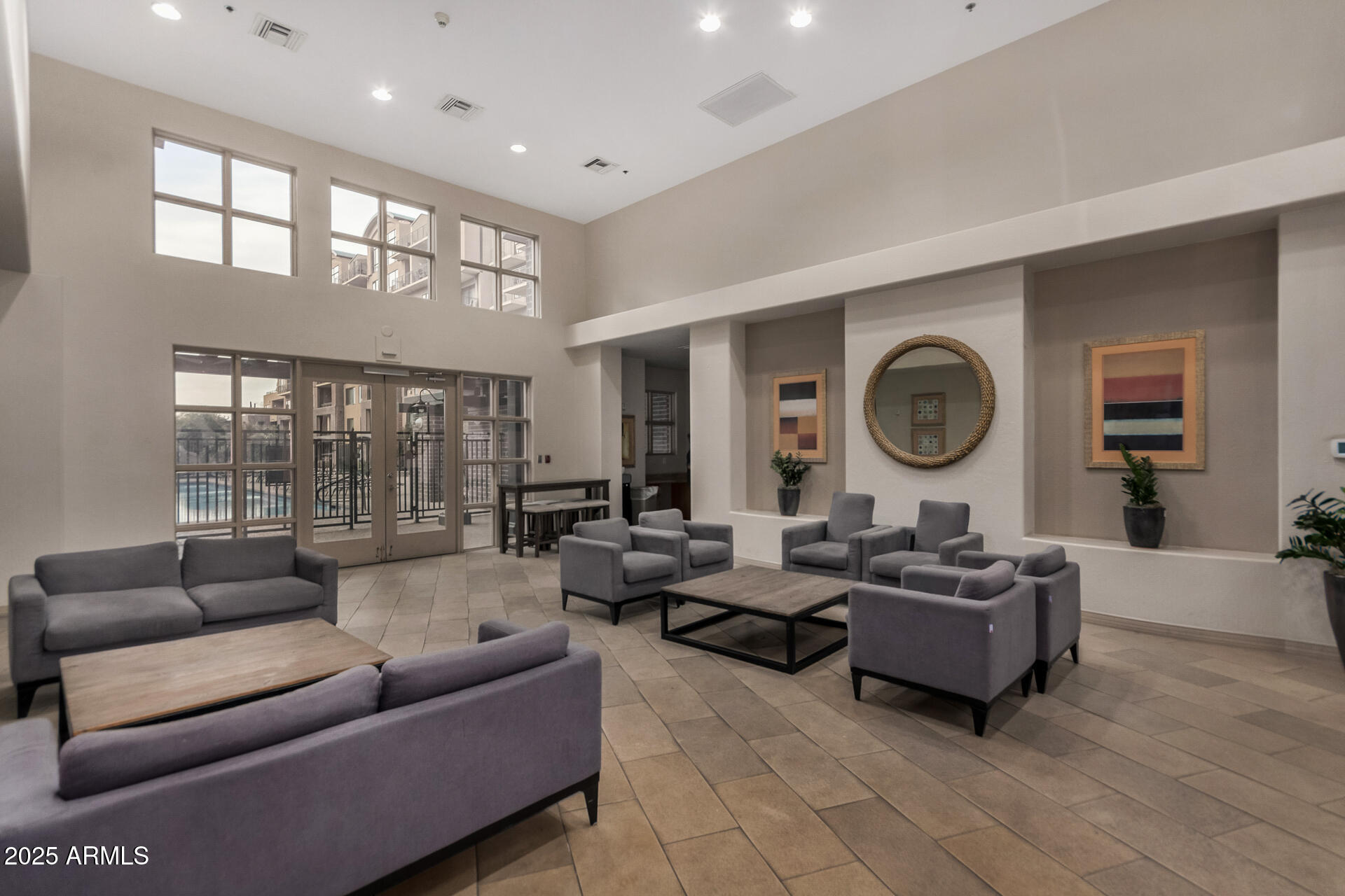 2302 North Central Avenue, Unit 206 Phoenix, AZ 85004 - Photo 26 of 35 a living room with furniture and a large window
