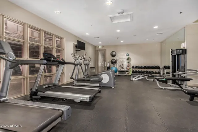 a view of a room with gym equipment