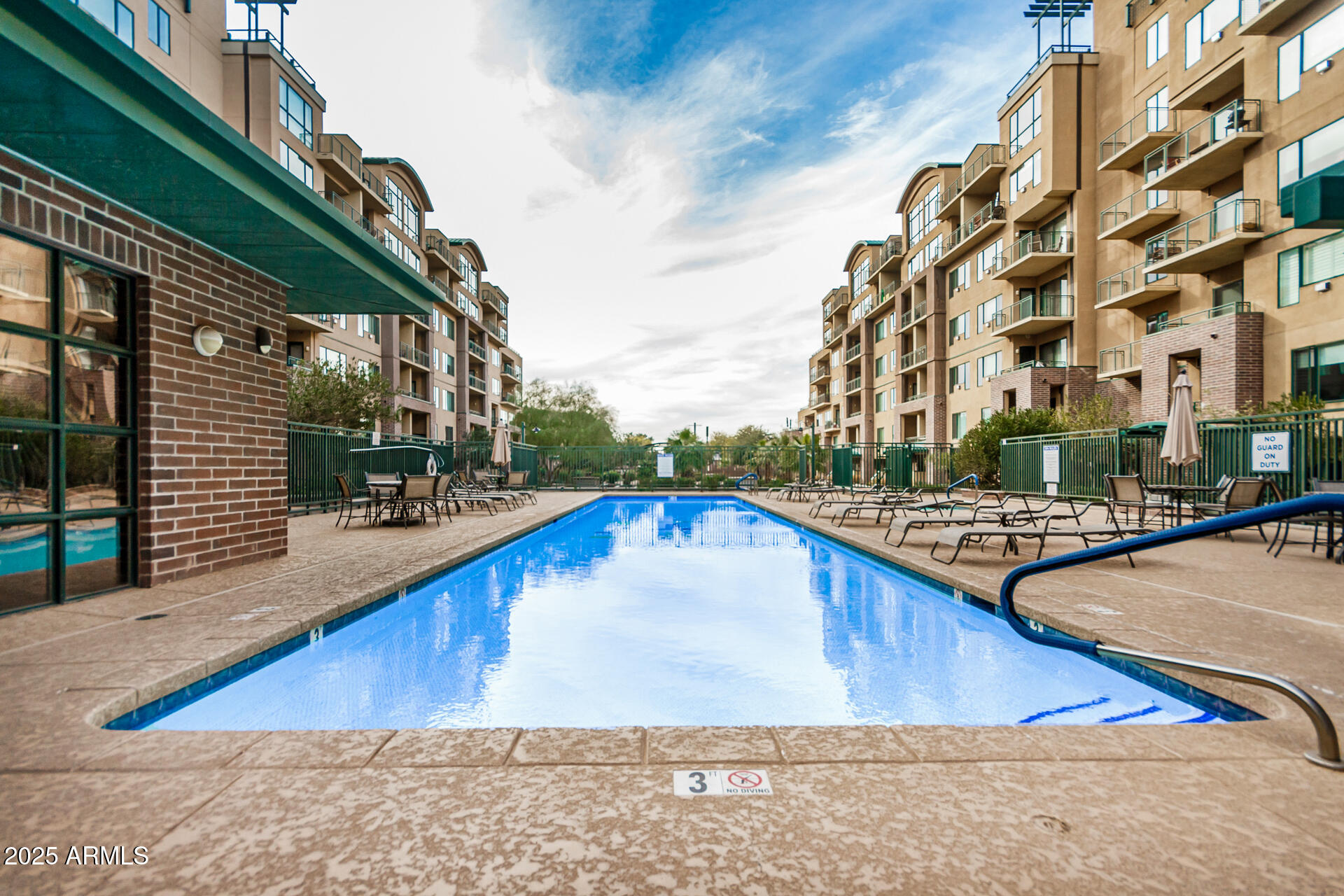 2302 North Central Avenue, Unit 206 Phoenix, AZ 85004 - Photo 30 of 35 a view of swimming pool with outdoor seating