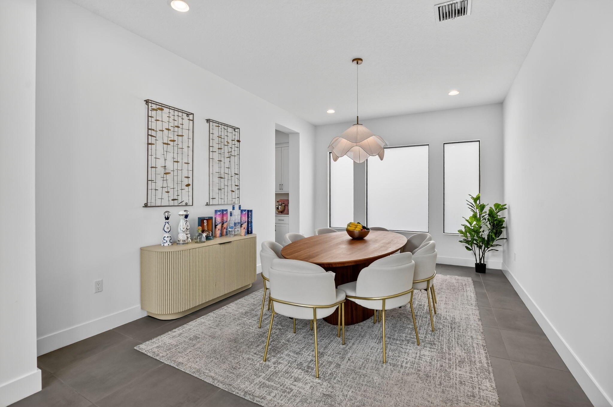 8284 Royal County Down Road Boca Raton, FL 33434 - Photo 11 of 121 a view of a dining room with furniture and wooden floor