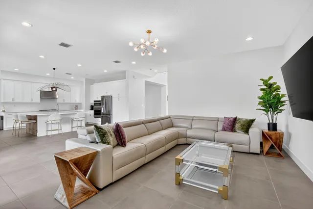a bathroom with a toilet a sink and a mirror