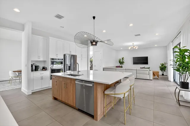 a bedroom with a bed and a desk