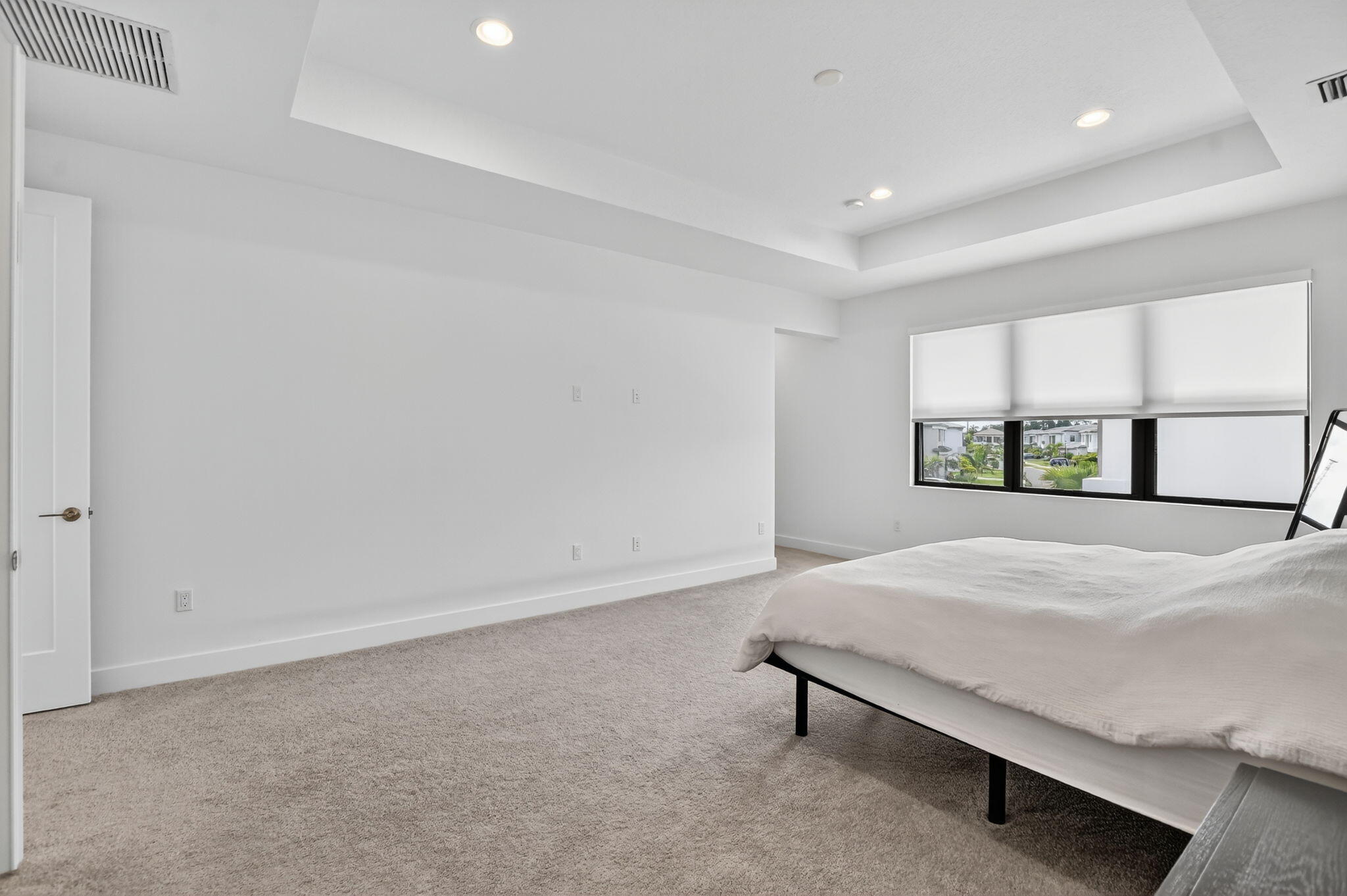 8284 Royal County Down Road Boca Raton, FL 33434 - Photo 38 of 121 a bedroom with a bed and a window