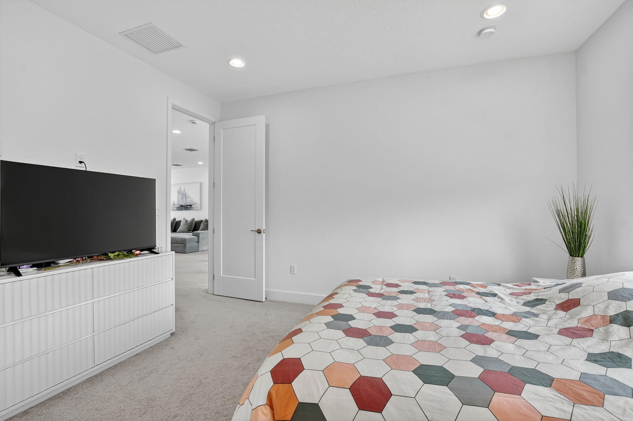 8284 Royal County Down Road Boca Raton, FL 33434 - Photo 46 of 121 a bedroom with bed and flat screen tv