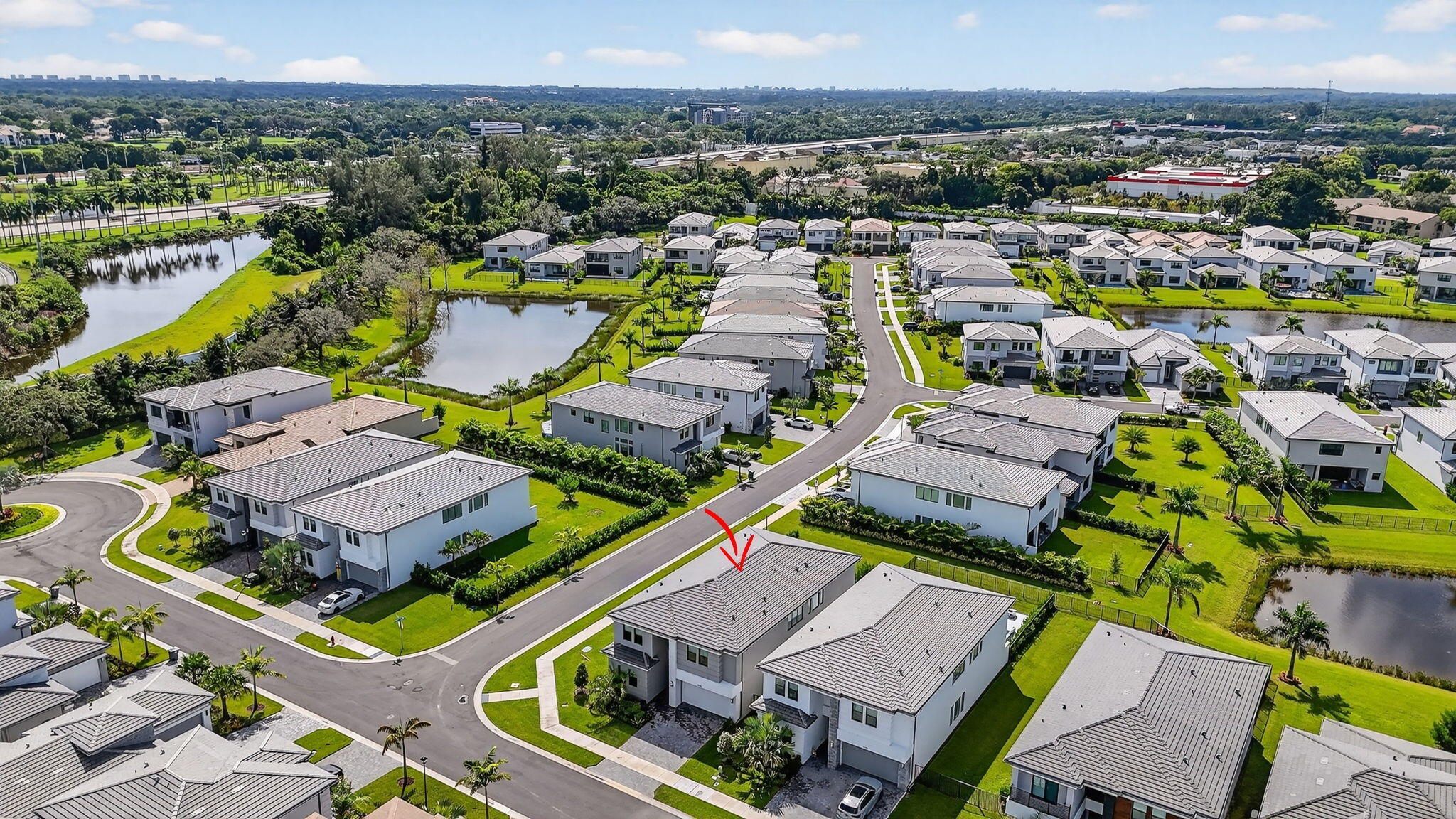8284 Royal County Down Road Boca Raton, FL 33434 - Photo 68 of 121 an aerial view of a house with a garden