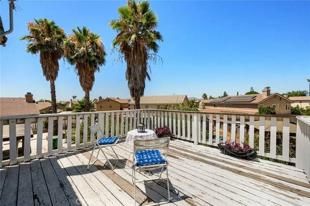 a view of washer and dryer with kitchen in the background