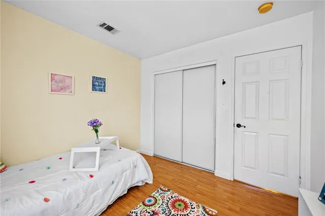 a front view of a house with sitting area