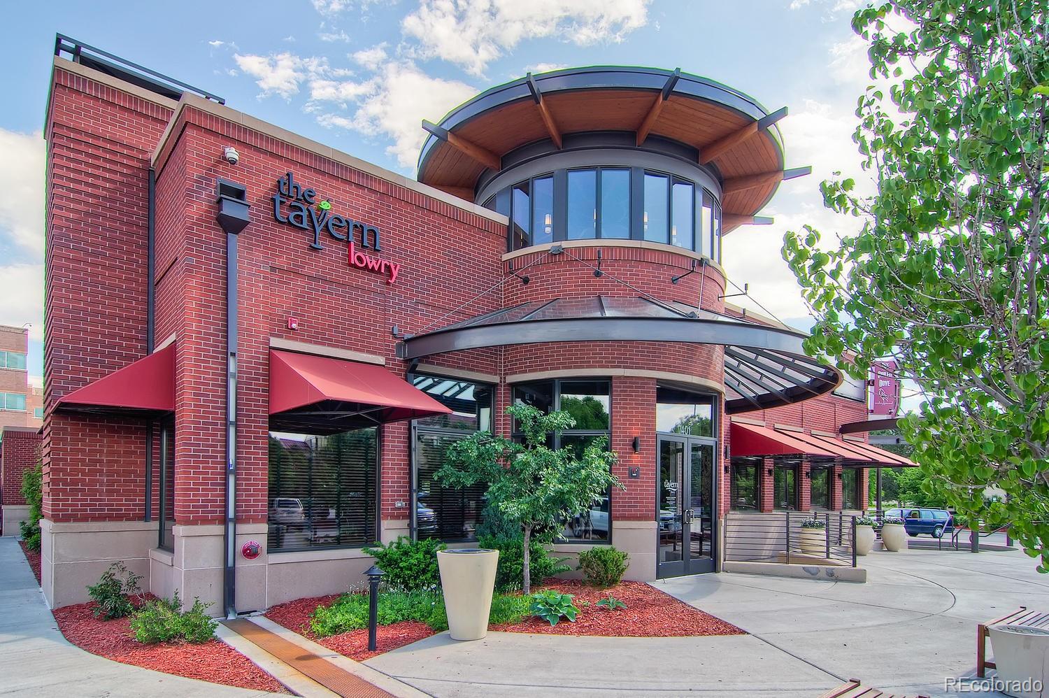 303 Alton Way Denver, CO 80230 - Photo 31 of 35 a front view of a building with street view