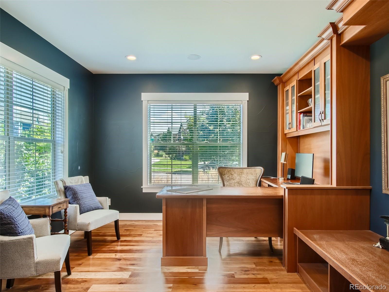 303 Alton Way Denver, CO 80230 - Photo 5 of 35 a workspace with furniture and a window