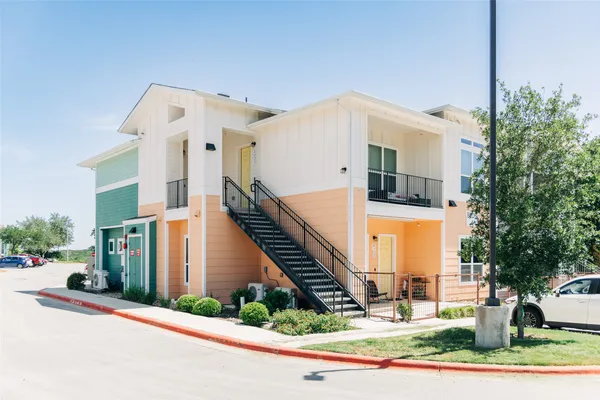 a view of a building with a street