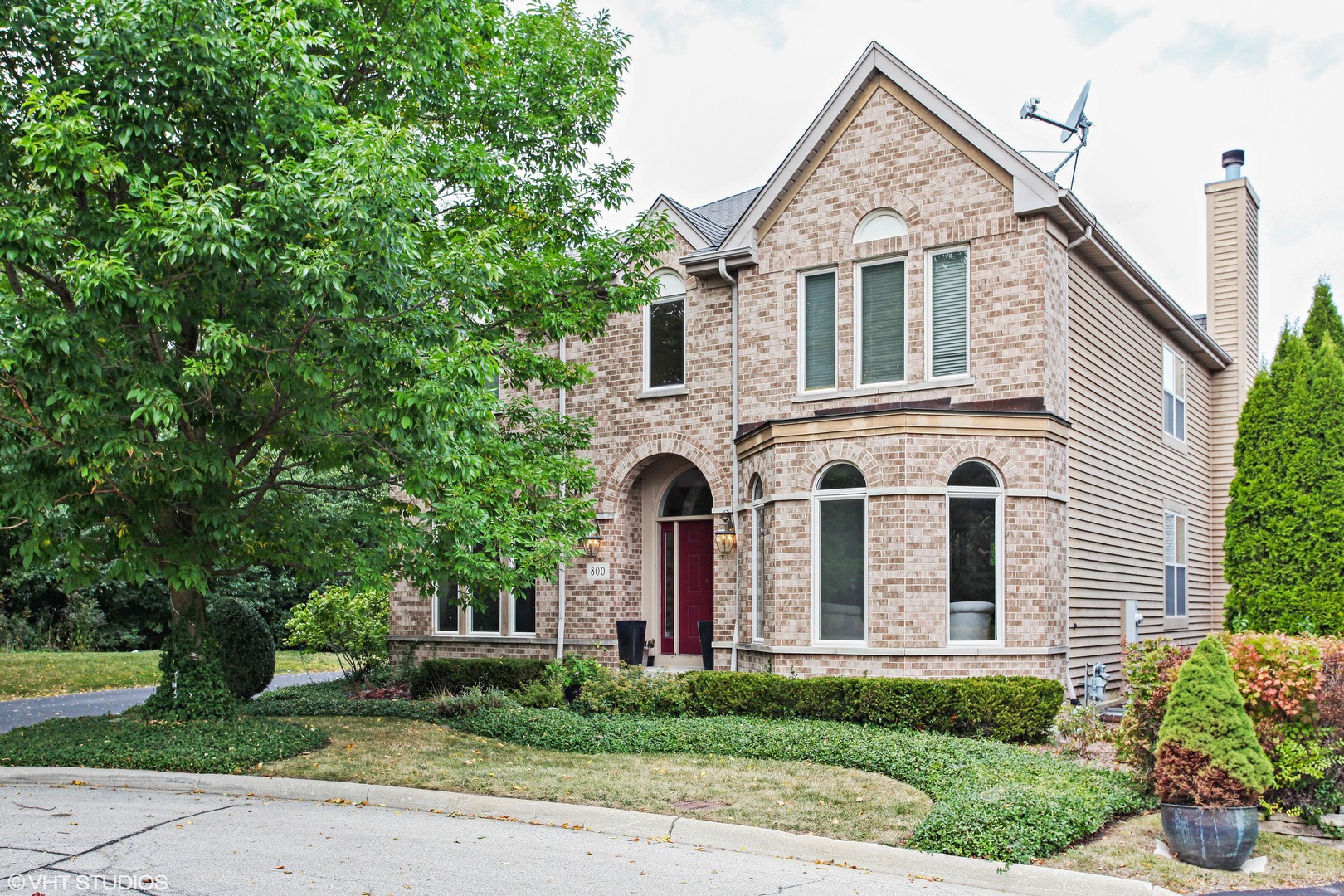 800 De Roo Loop Highwood, IL 60040 - Photo 1 of 22 a front view of a house with garden
