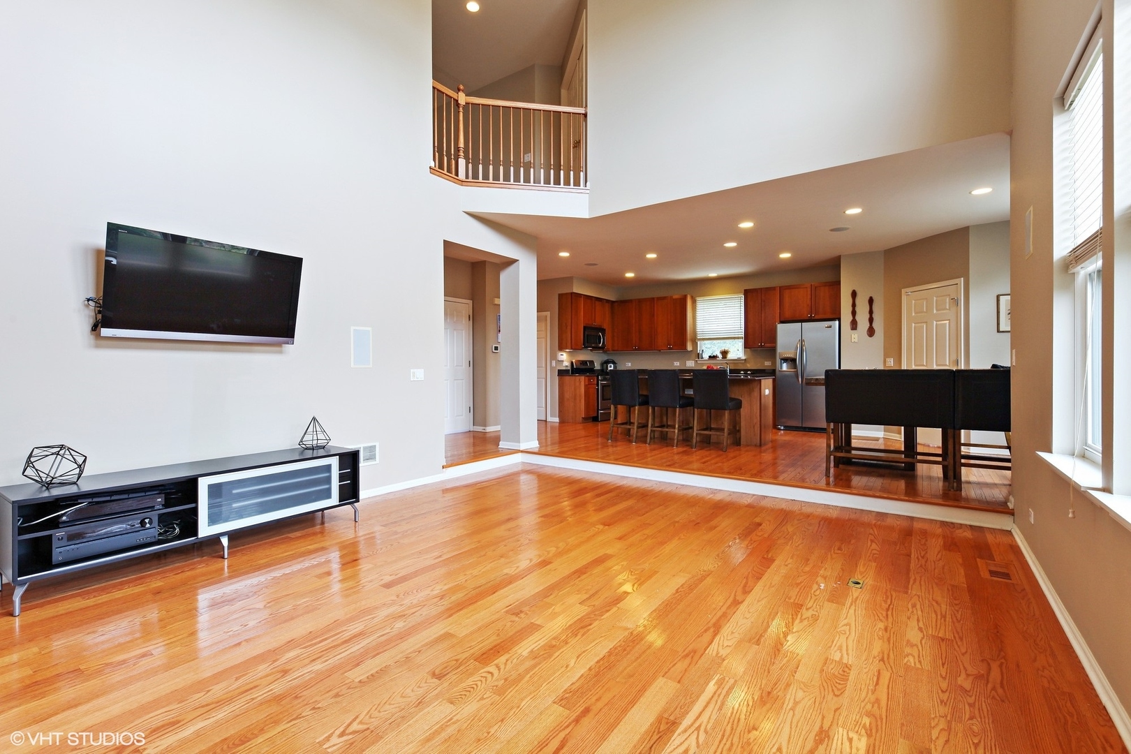 800 De Roo Loop Highwood, IL 60040 - Photo 7 of 22 a lobby with furniture and a flat screen tv