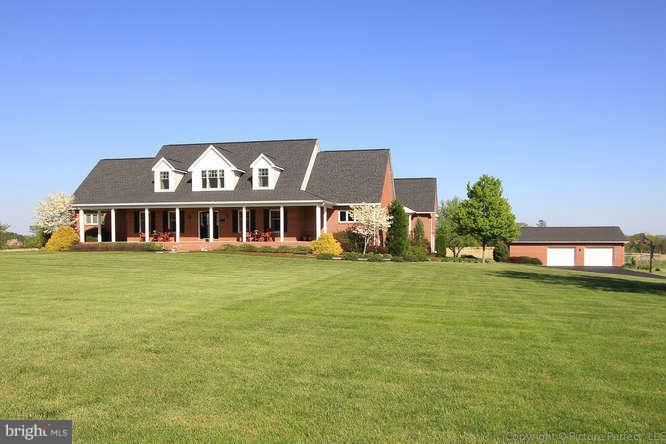 9671 Masser Road Frederick, MD 21702 - Photo 1 of 1 a front view of a house with a garden