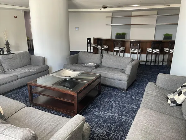a living room with furniture and a couch