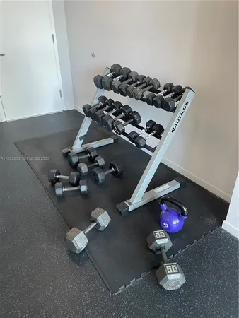 a view of a room with gym equipment