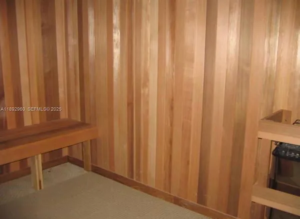 a view of a balcony with two chairs