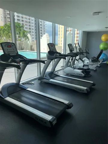 a view of a room with gym equipment