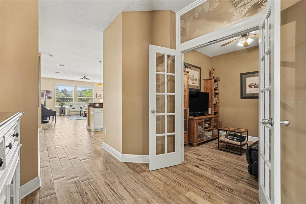 2134 Barracuda Court Holiday, FL 34691 - Photo 7 of 36 a view of a living room with a wooden floor