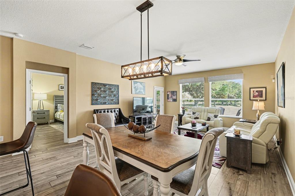 2134 Barracuda Court Holiday, FL 34691 - Photo 10 of 36 a view of a dining room with furniture window and outside view