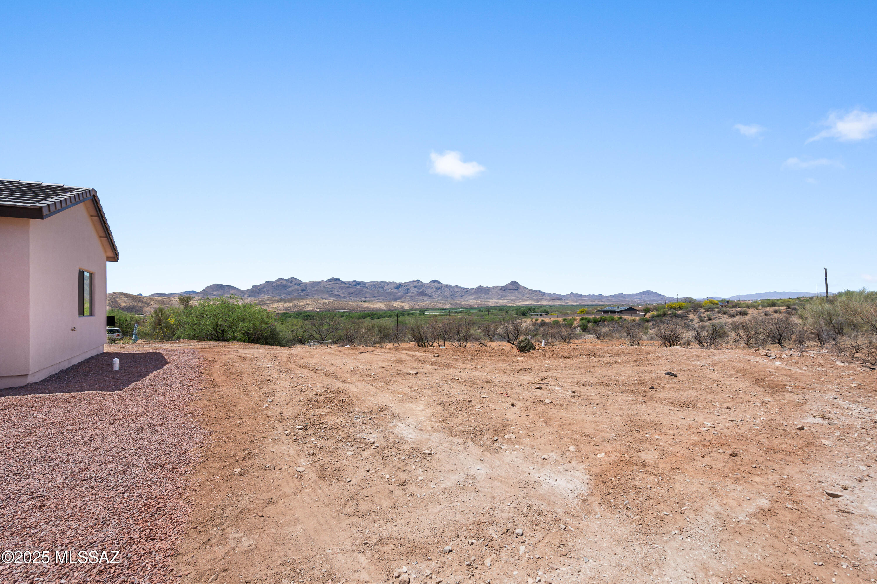1560 Pinguinos Court Rio Rico, AZ 85648 - Photo 31 of 33 a view of an lake and a mountain
