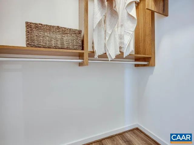 a view of walk in closet with window