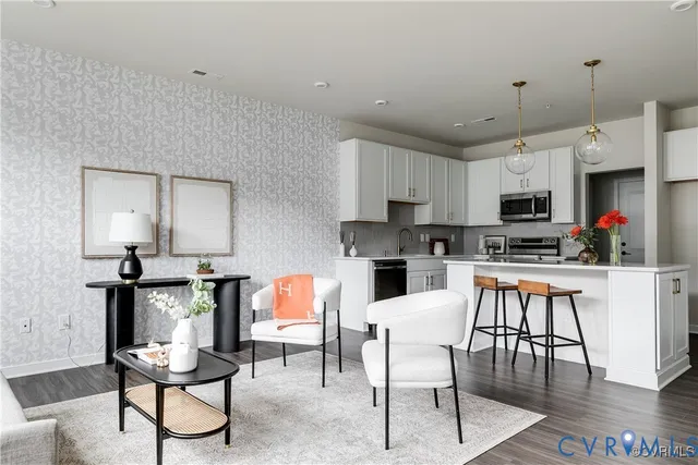 a view of kitchen with cabinets and outdoor view