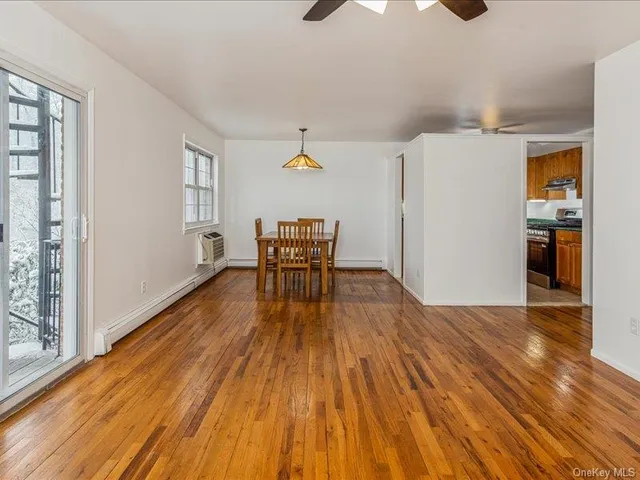 a view of a livingroom with furniture and wooden floor