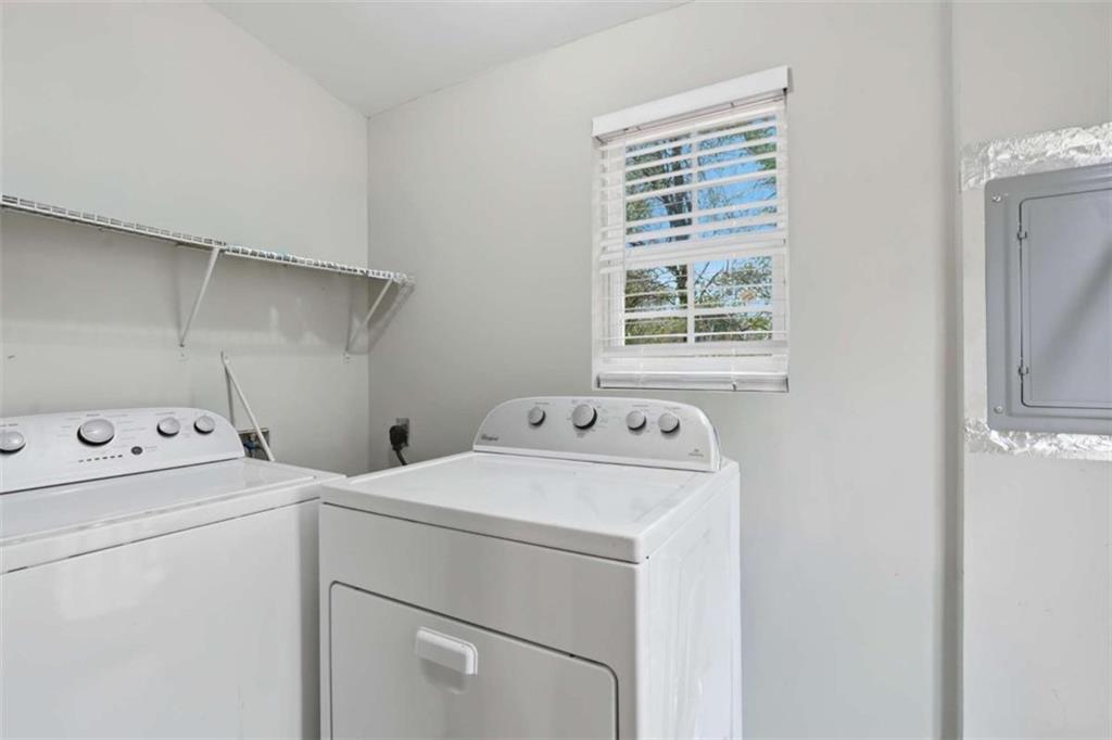 1295 Double Bridges Road Winder, GA 30680 - Photo 12 of 59 a utility room with dryer and washer