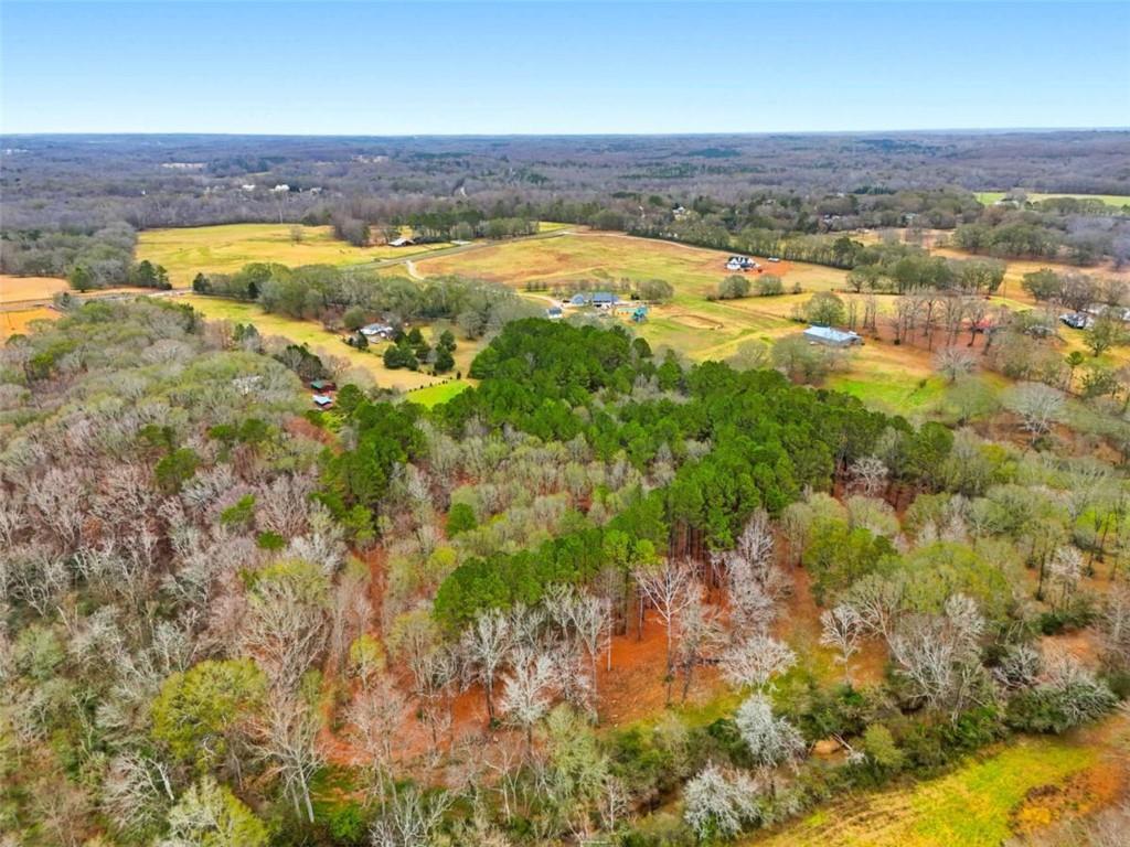 1295 Double Bridges Road Winder, GA 30680 - Photo 31 of 59 an aerial view of residential houses with outdoor space and swimming pool