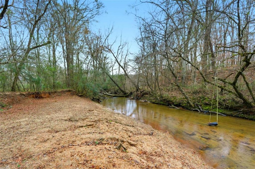 1295 Double Bridges Road Winder, GA 30680 - Photo 48 of 59 a view of a lake with houses