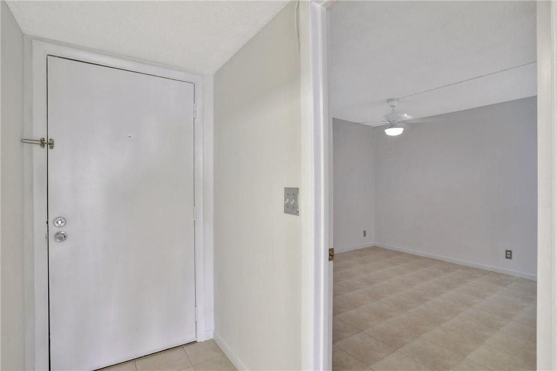 3939 Northeast 5th Avenue, Unit F104 Boca Raton, FL 33431 - Photo 12 of 34 a view of an empty room