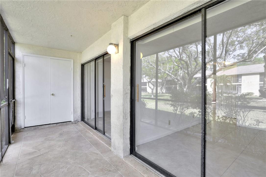 3939 Northeast 5th Avenue, Unit F104 Boca Raton, FL 33431 - Photo 28 of 34 a view of entryway with livingroom