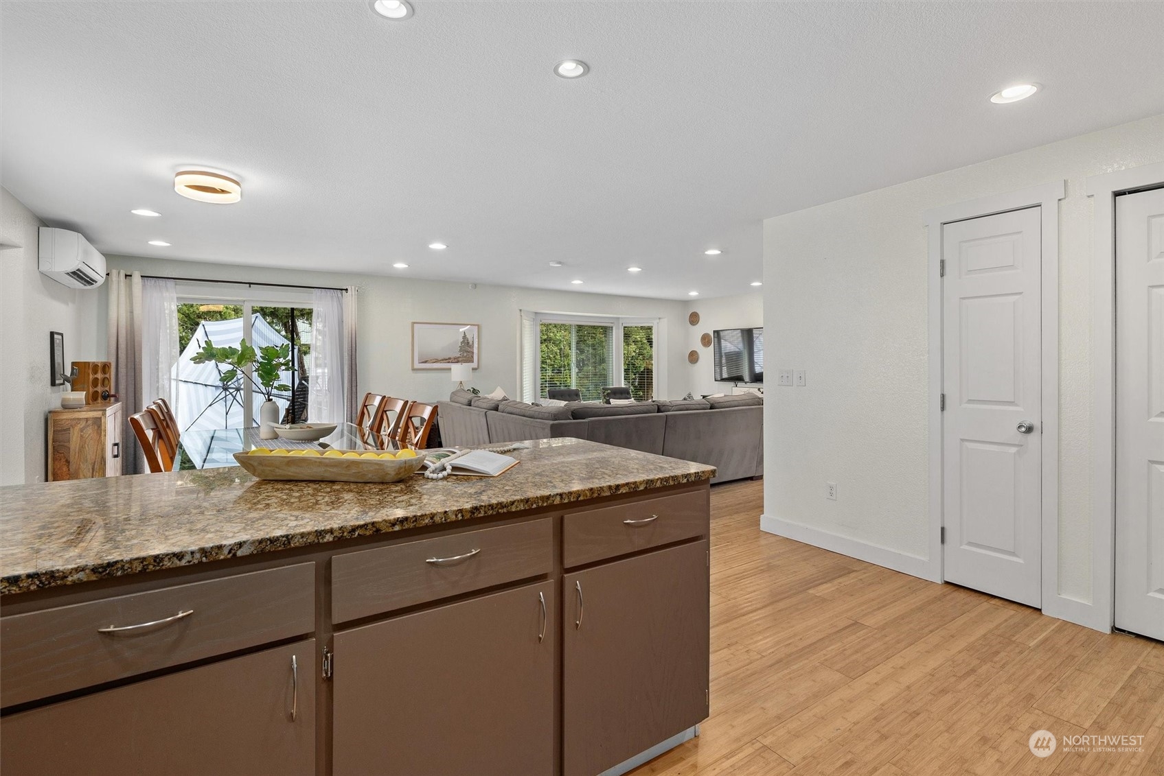 17327 18th Avenue Southeast Bothell, WA 98012 - Photo 7 of 33 a kitchen with a sink and a refrigerator