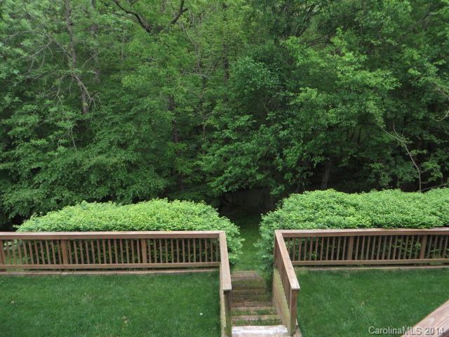 200 Melbourne Drive Fort Mill, SC 29708 - Photo 22 of 24 a view of a wooden deck and a yard