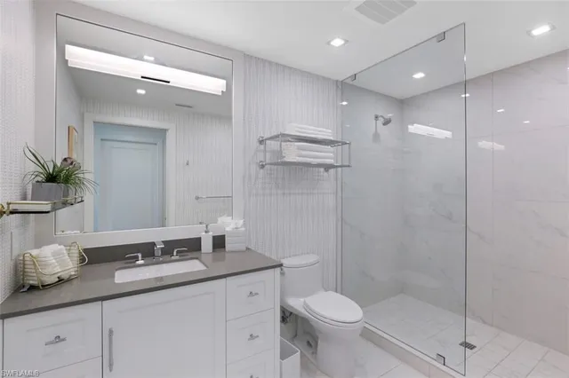 a view of a living room and balcony