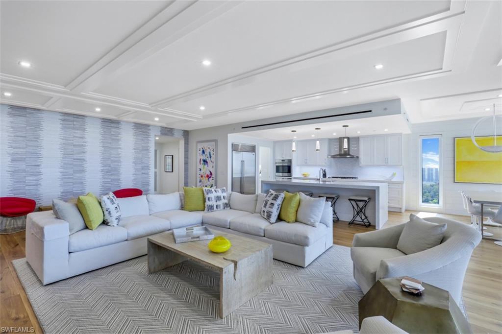 13915 Old Coast Road, Unit 1601 Naples, FL 34110 - Photo 3 of 37 a living room with furniture and a couch