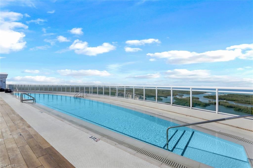 13915 Old Coast Road, Unit 1601 Naples, FL 34110 - Photo 32 of 37 a view of a terrace with skyline
