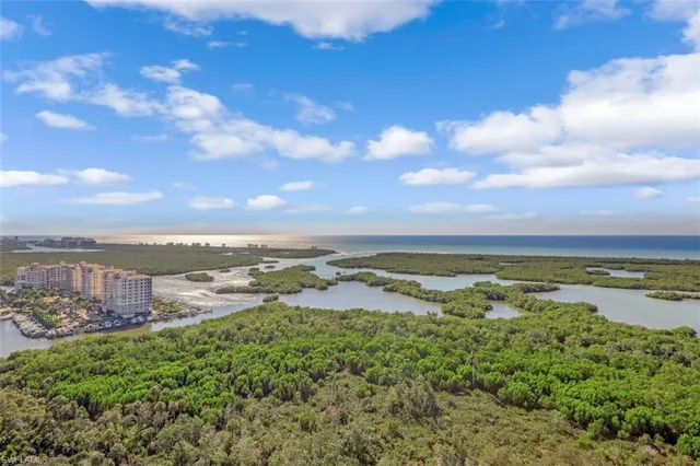 a view of a house next to a yard