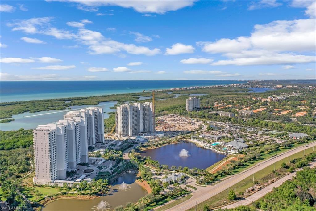 13915 Old Coast Road, Unit 1601 Naples, FL 34110 - Photo 34 of 37 a view of a city and ocean