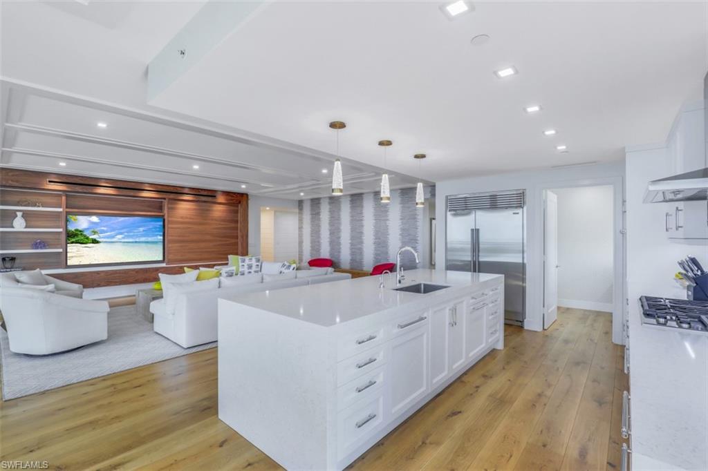 13915 Old Coast Road, Unit 1601 Naples, FL 34110 - Photo 36 of 37 a very nice looking room with a large window