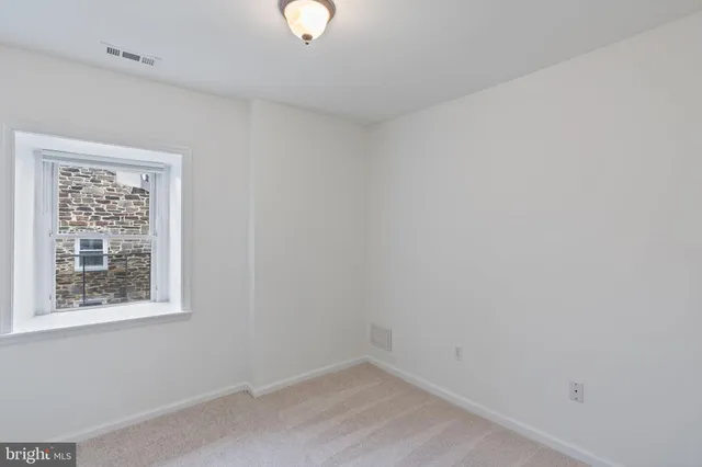 an empty room with a window