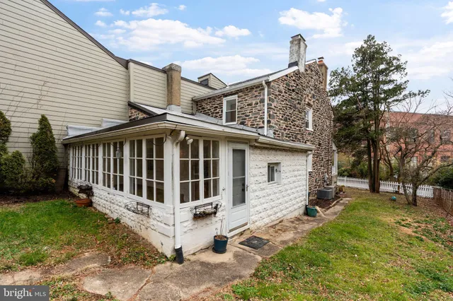 a view of a backyard of the house