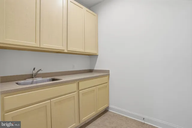 a utility room with a sink